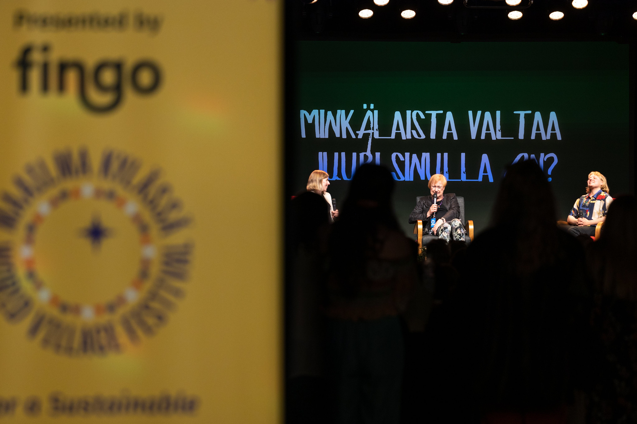 Panelists on the festival's Speaker's Stage.